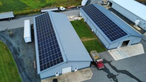 Aerial view of two shop buildings with rooftop solar in Columbia County, PA
